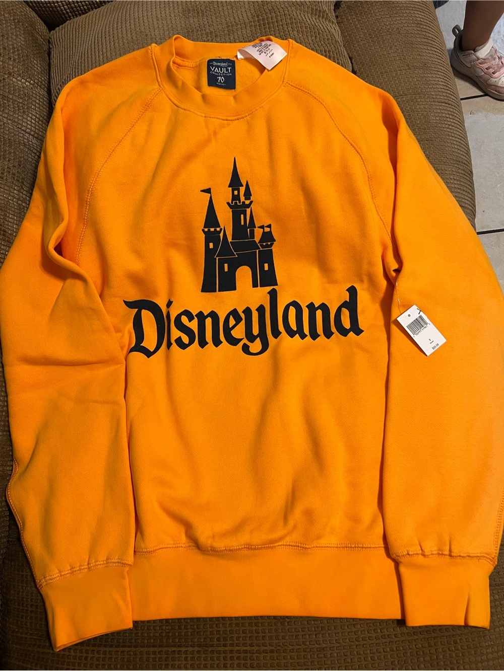 Disney Vault Collection: Orange Crewneck Sweatshirt with Black Castle Logo